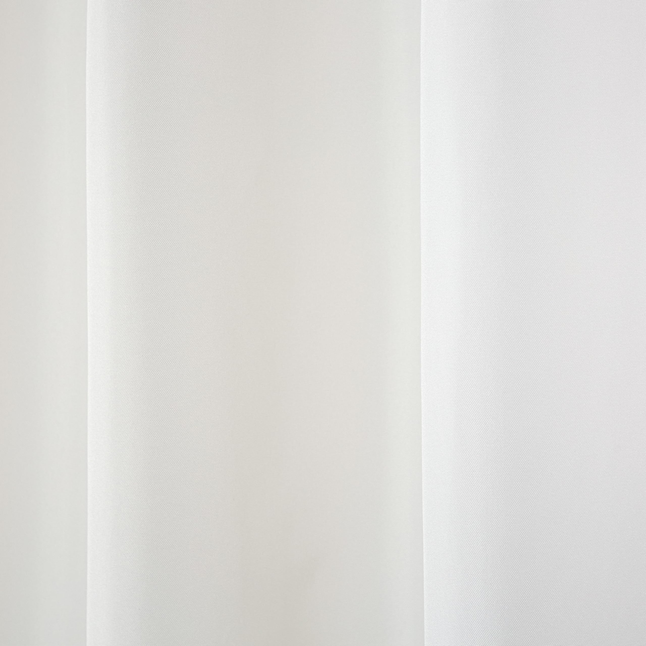 TOWN & COUNTRY BASICS outdoor curtains hanging on a patio