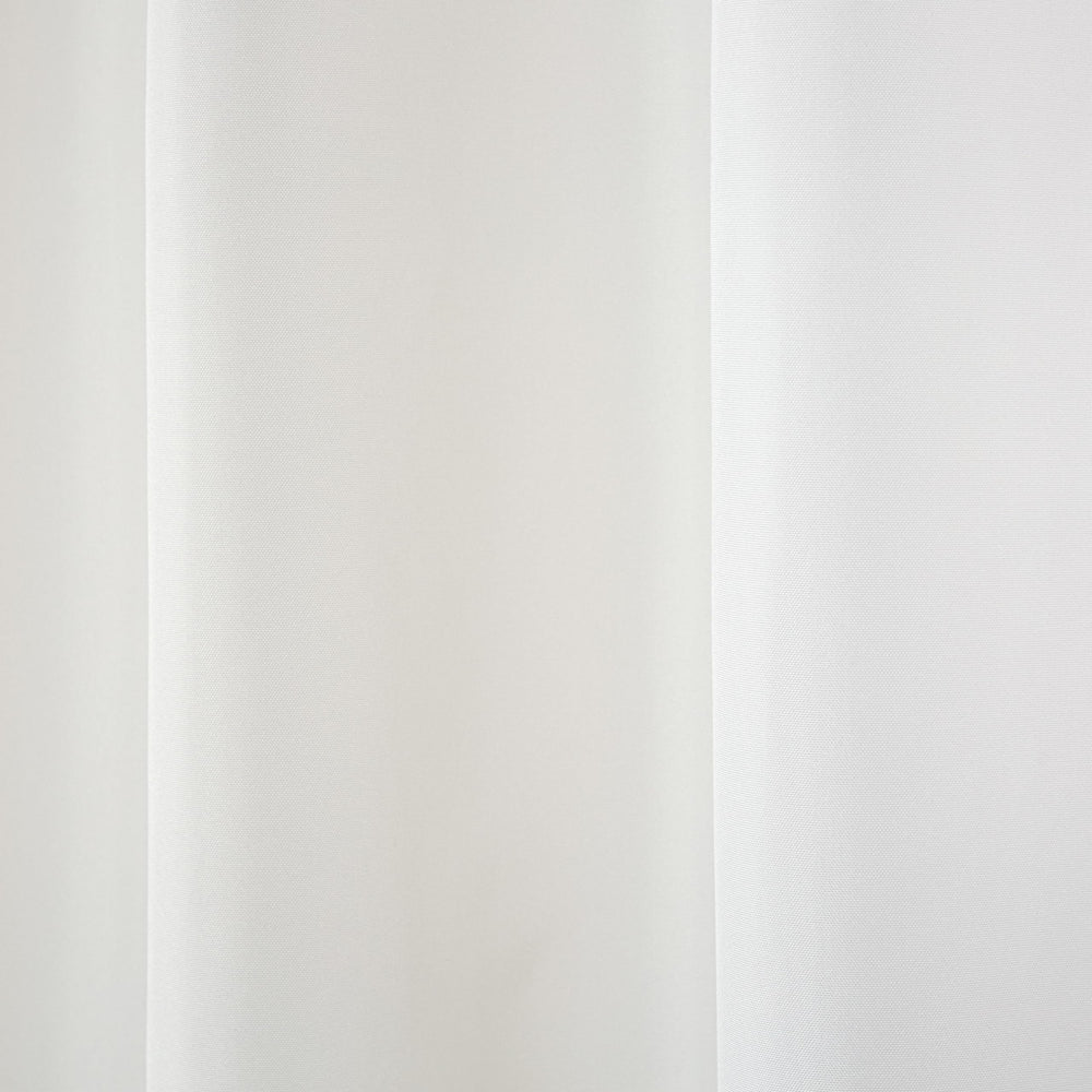 TOWN & COUNTRY BASICS outdoor curtains hanging on a patio