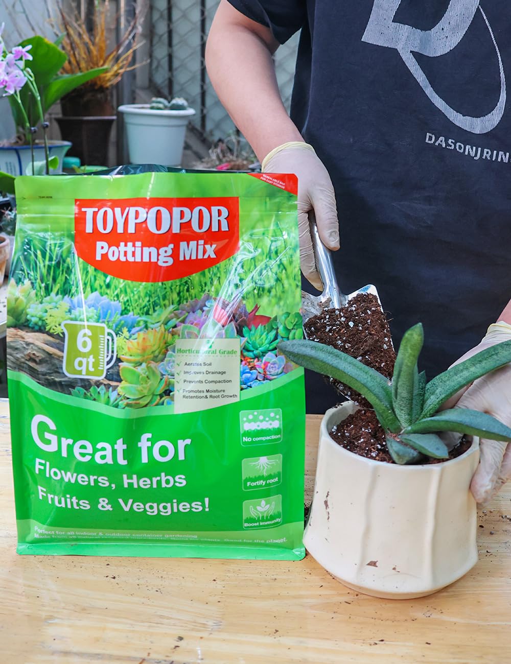 TOYPOPOR potting soil being used in a gardening setup