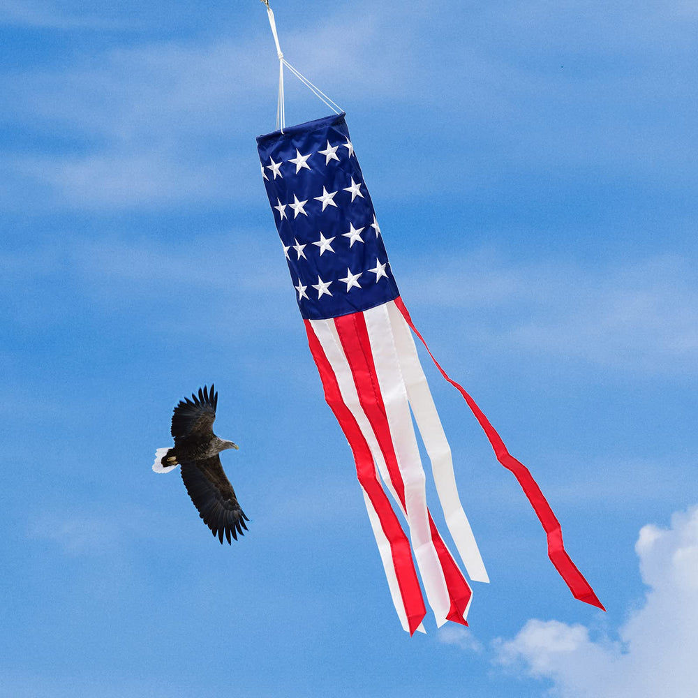 TPFEYEN American Flag Windsock hanging in a garden