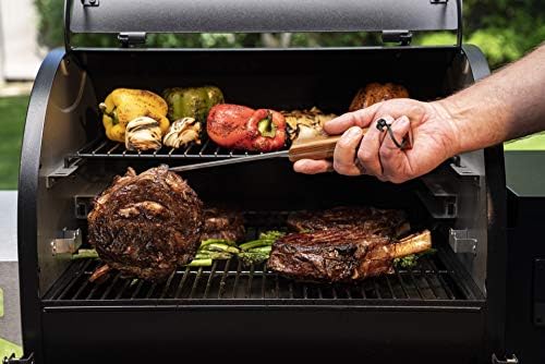 Traeger BBQ Pig Tail Meat Hook displayed on a grill