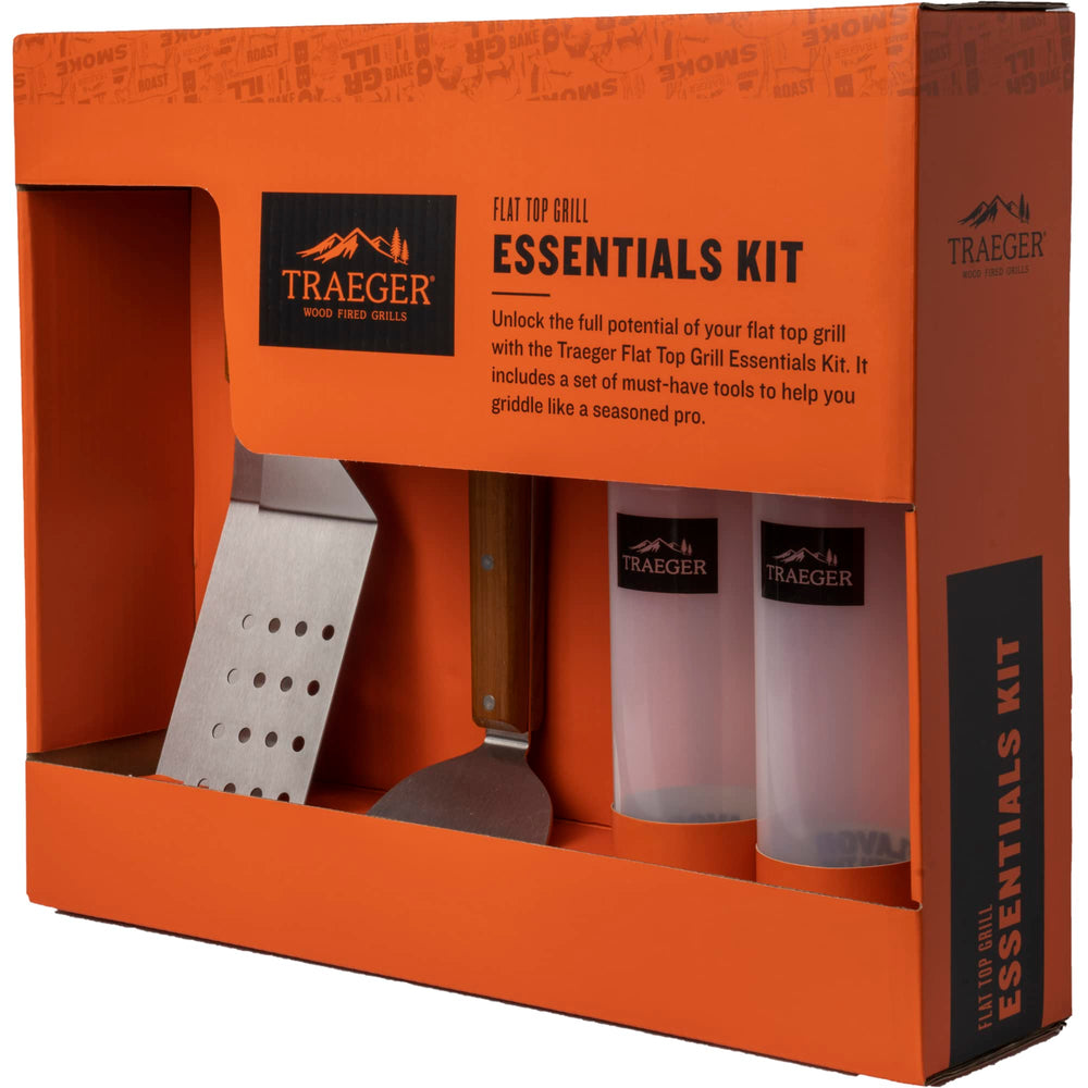 Traeger Flat Top Griddle Essentials Kit including spatulas, scraper, and squeeze bottles