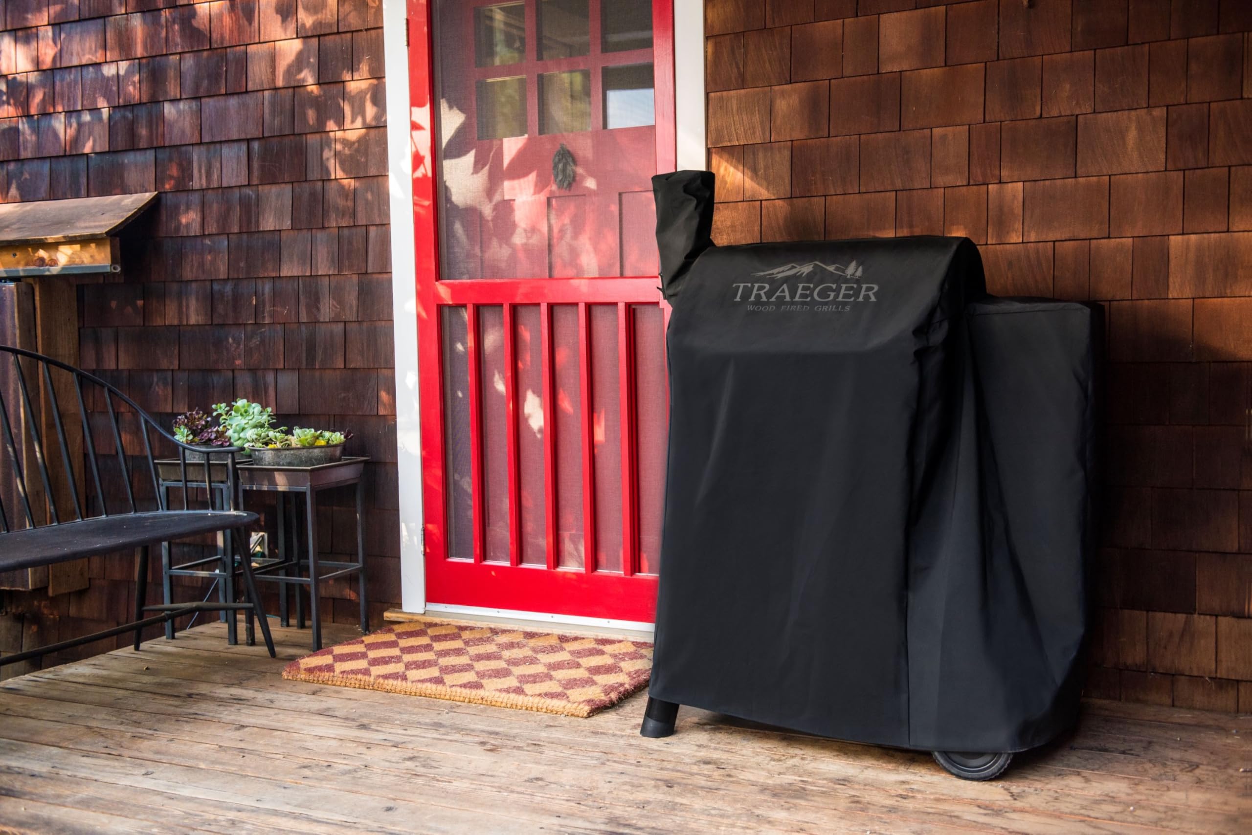 Traeger grill cover shown in outdoor setting