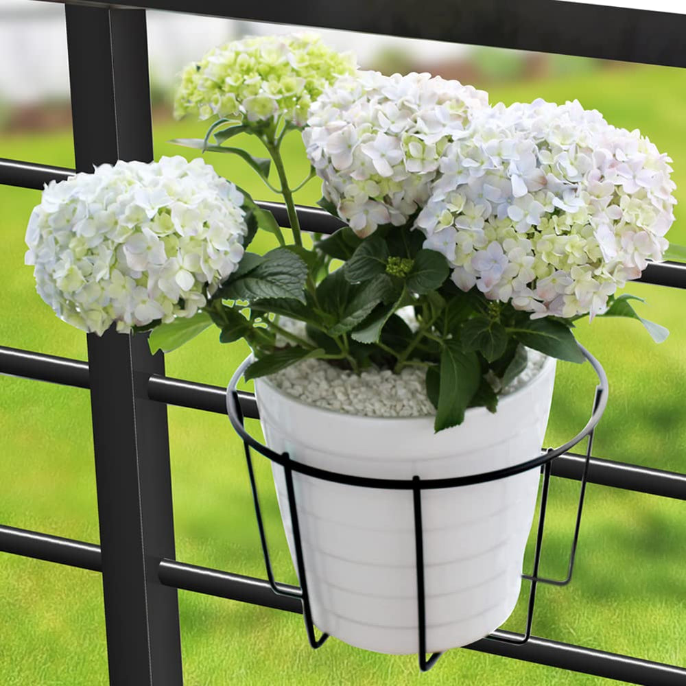 TreeLen railing planter with flowers on balcony