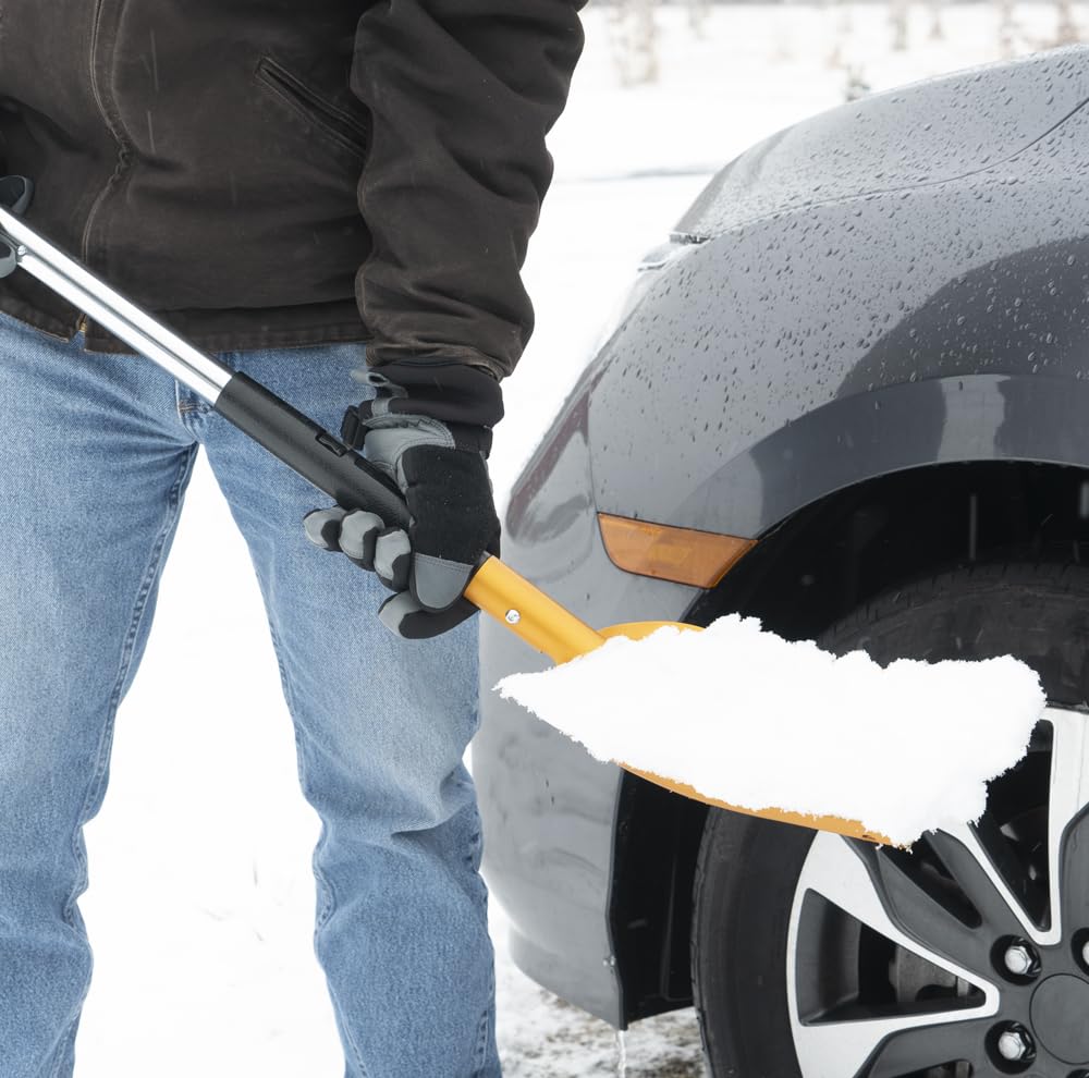 TRUE TEMPER shovel being used to clear snow from a car