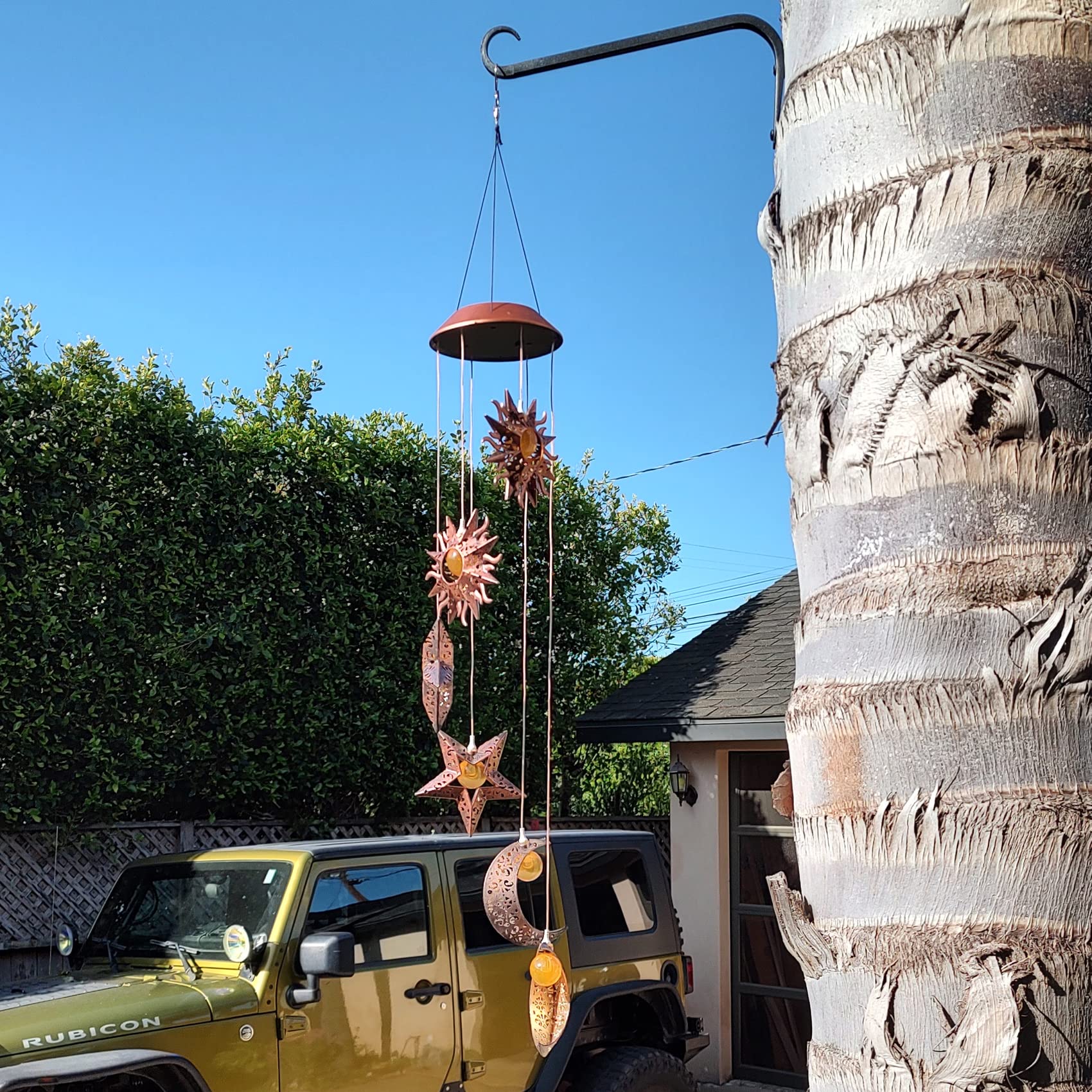 Tryme Solar Wind Chimes displayed on a porch