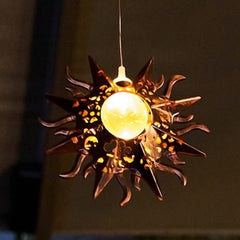 Tryme Solar Wind Chimes during nighttime glow