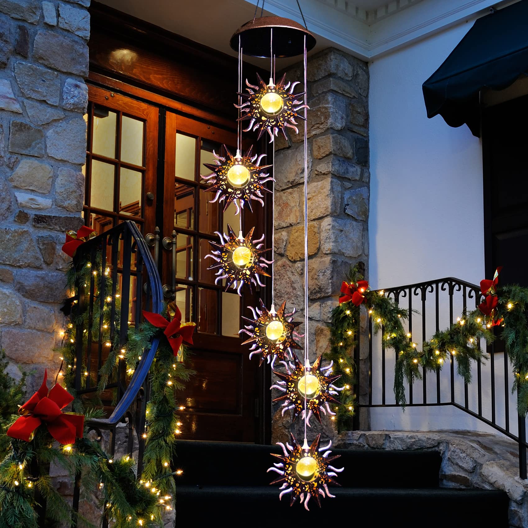 Tryme Solar Wind Chimes hanging in a garden
