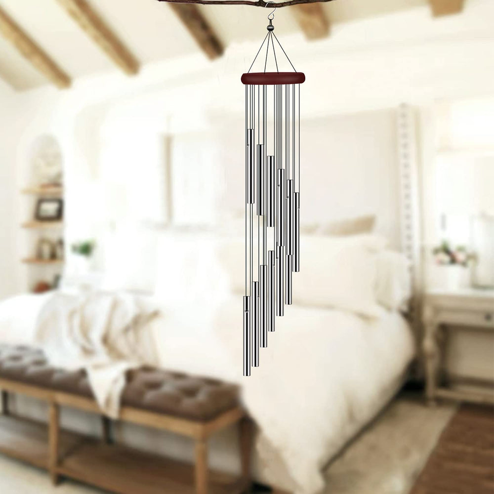 tujol Wind Chimes displayed on a patio table