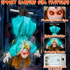 TURNMEON animatronic doll hanging upside down in an outdoor setting