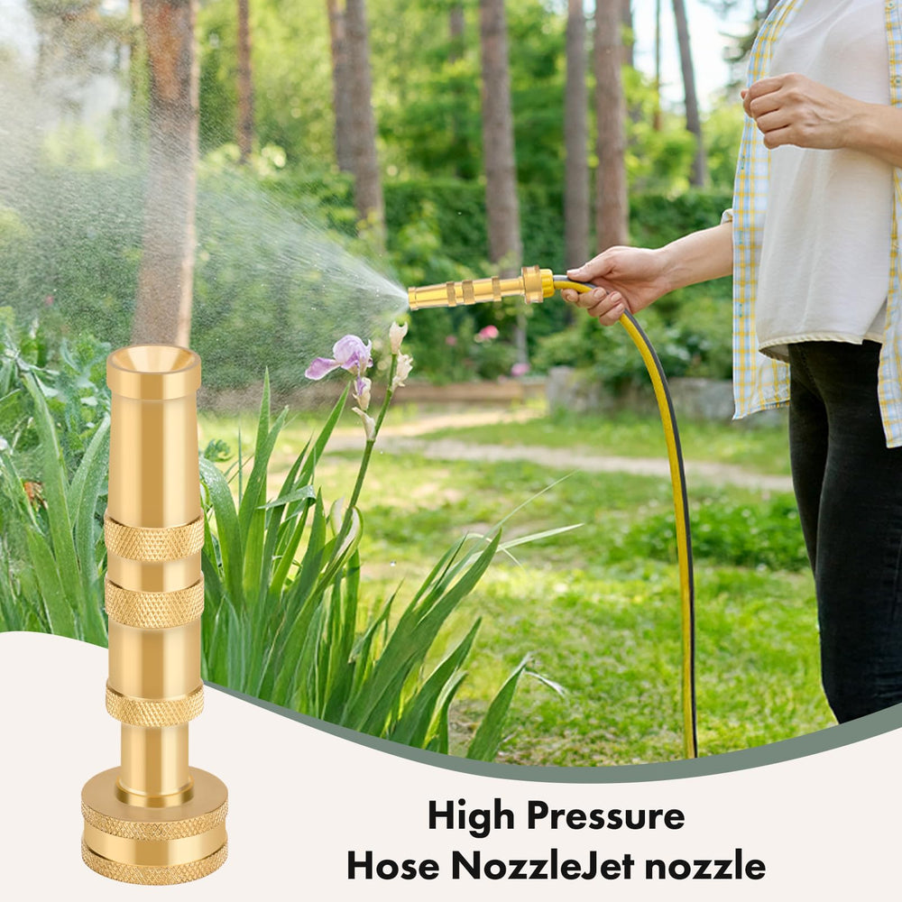 Twinkle Star garden hose nozzle with water spraying from the tip