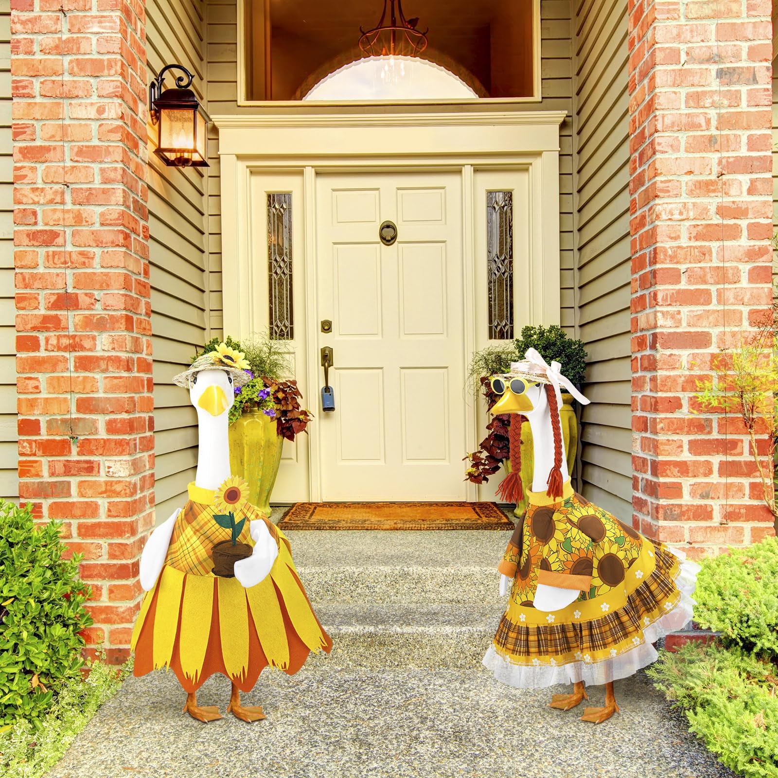 Two Abbylike sunflower porch goose outfits displayed together