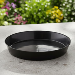 Two Austin Planter black saucers stacked