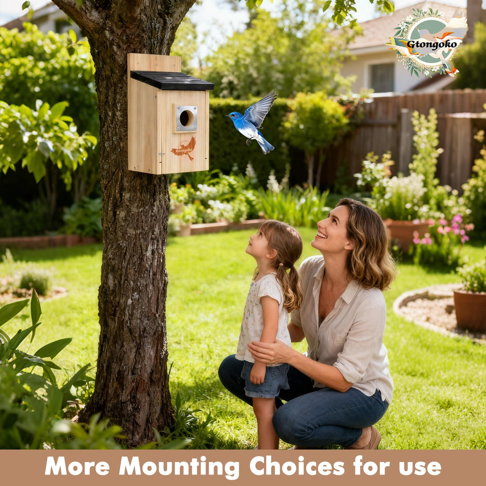 Two Gtongoko birdhouses side by side with foliage