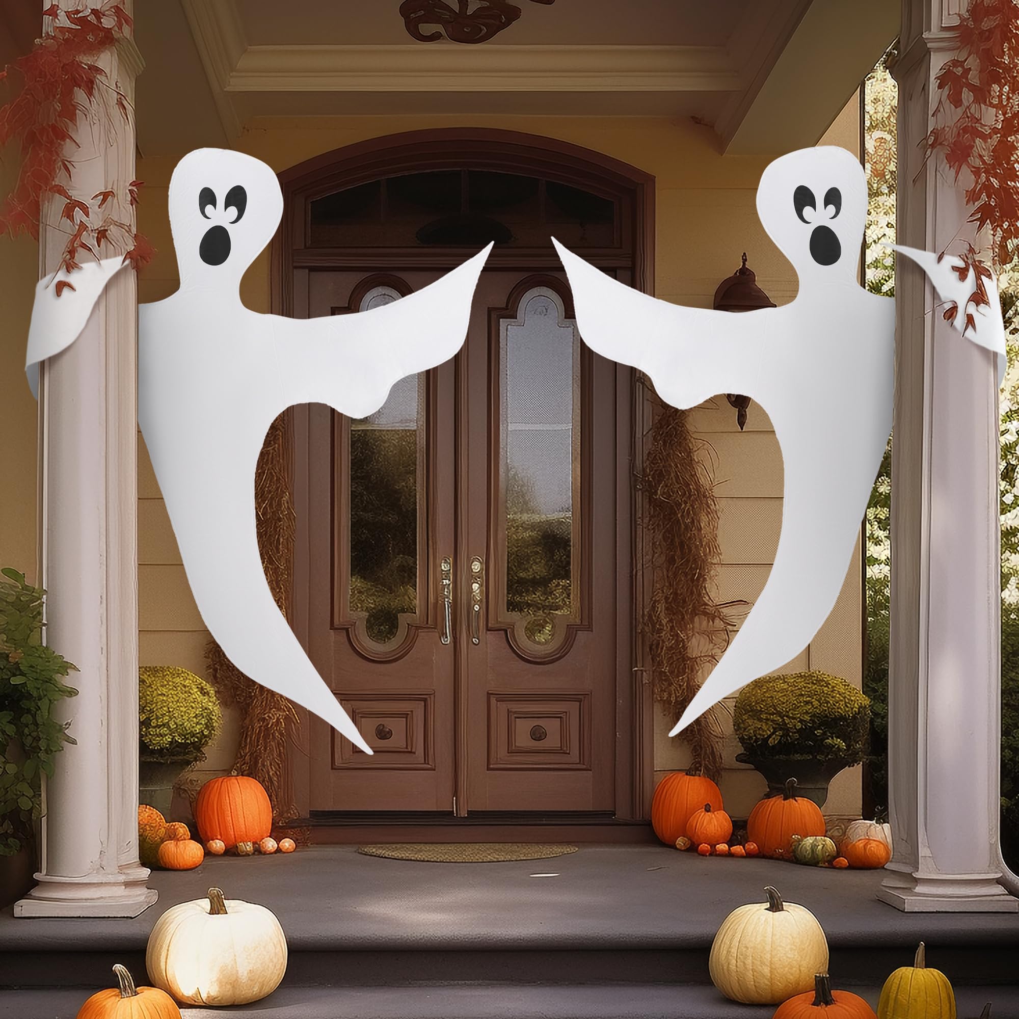 Two JOYIN Halloween ghosts displayed in a garden setting