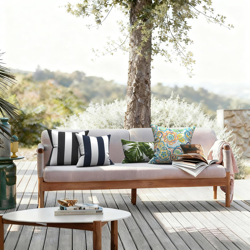 Two LVTXIII Cabana Black Outdoor Pillow Covers side by side