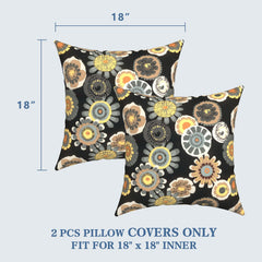 Two LVTXIII outdoor pillow covers displayed on patio furniture