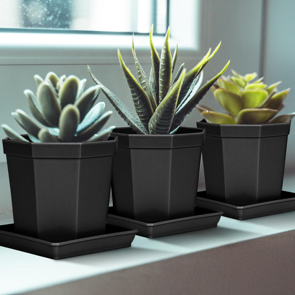 Two LWALRS 16-inch square plant saucers stacked