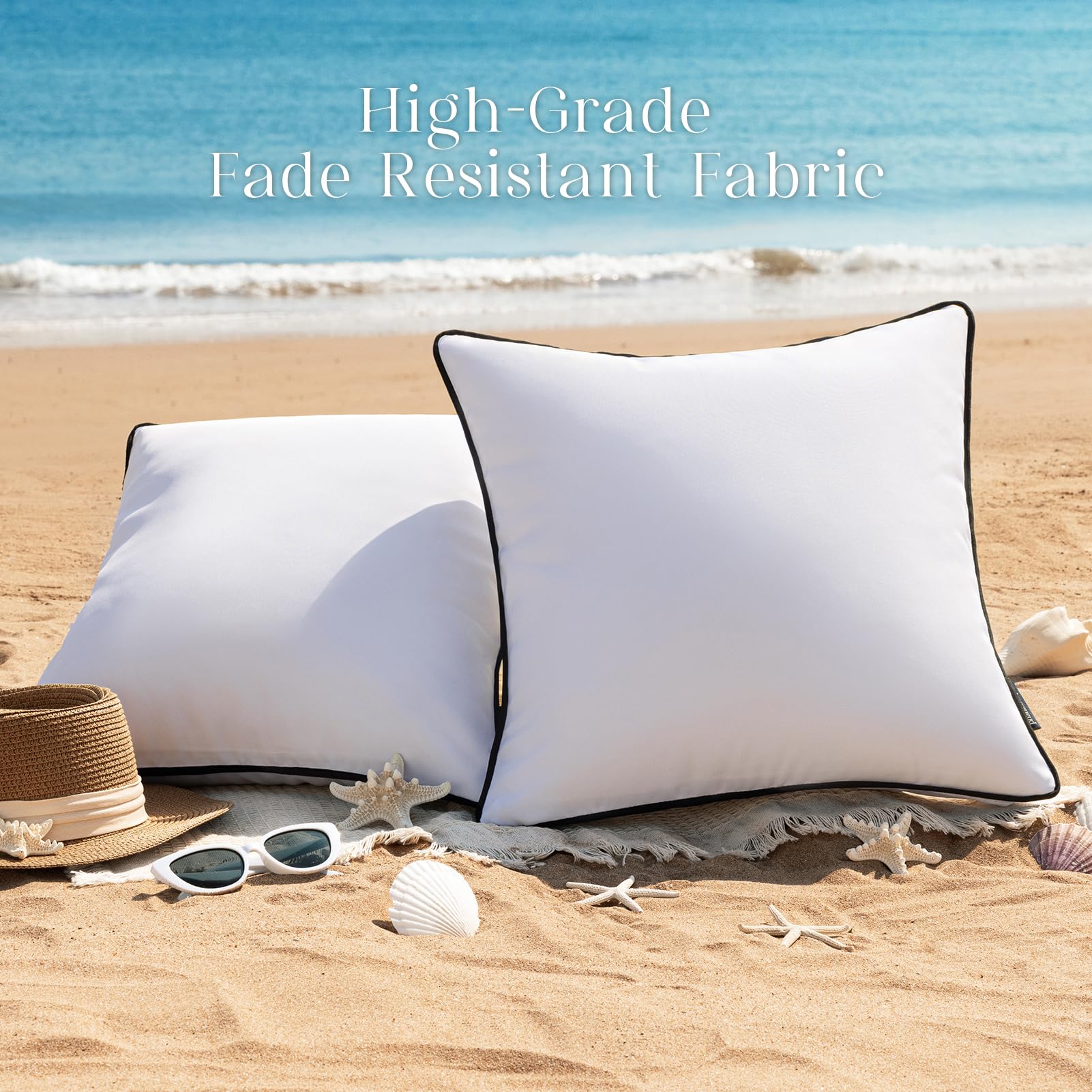 Two Phantoscope white pillow covers in a garden setting