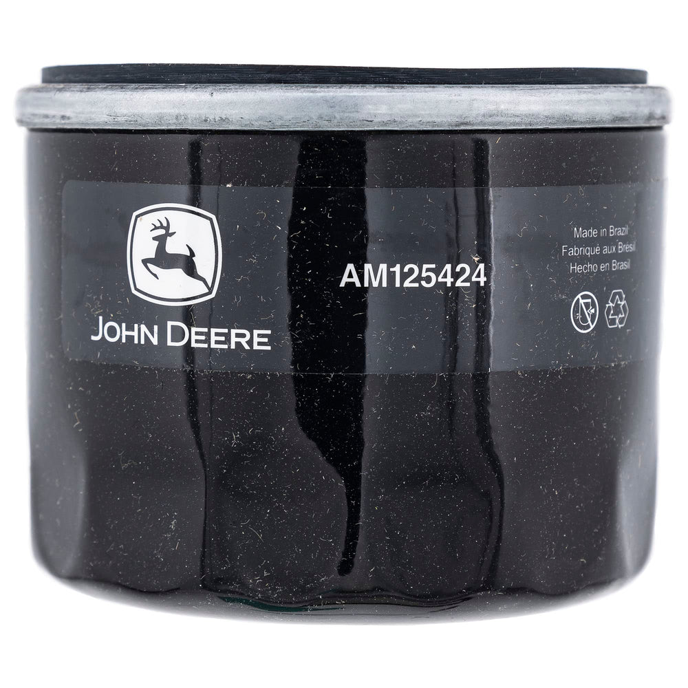Two quarts of 10W-30 Turf Gard oil from kit