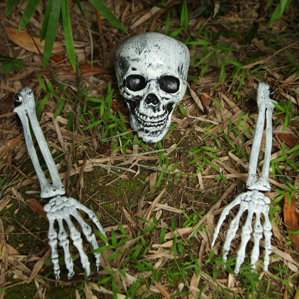 Two skeleton arms with stakes for Halloween decoration