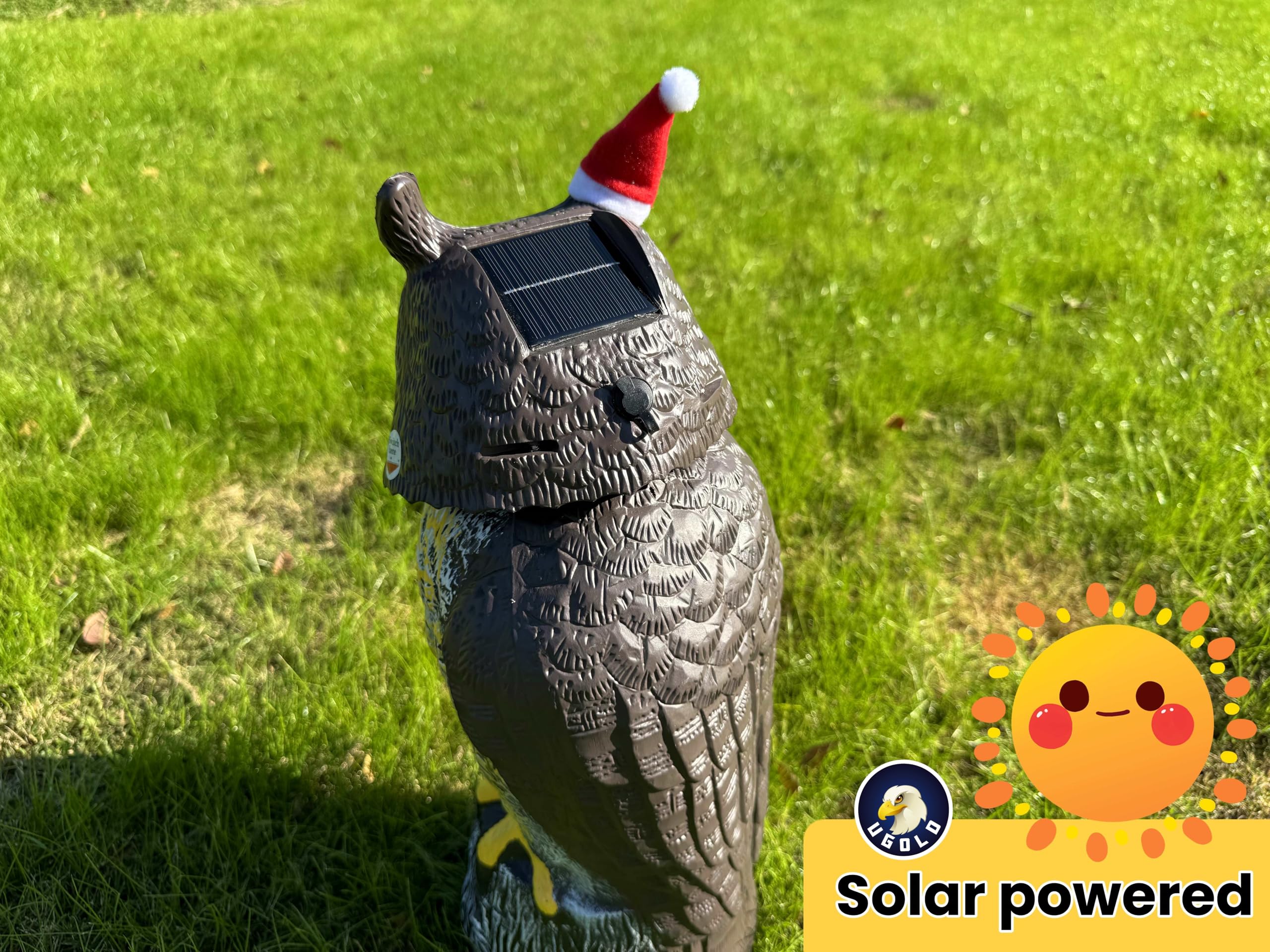 Ugold Owl statue in winter snow