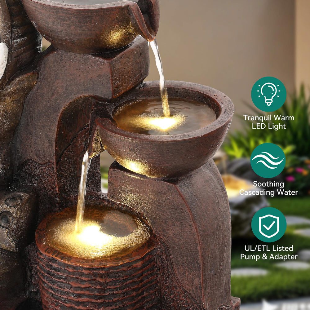 Ultym outdoor fountain illuminated at night