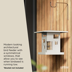 Umbra Bird Cafe Bird Feeder hanging in garden