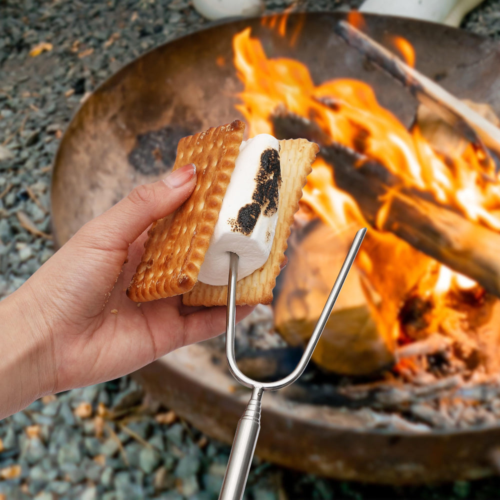 UNCO Marshmallow Roasting Sticks in a backyard barbecue setting