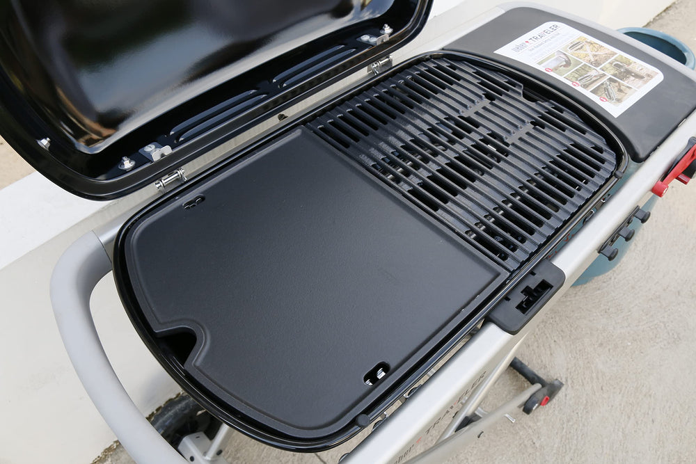 Uniflasy Cast Iron Griddle Plate installed on Weber Traveler grill
