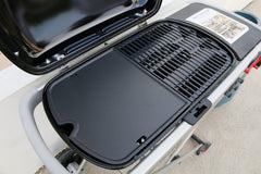 Uniflasy Cast Iron Griddle Plate installed on Weber Traveler grill