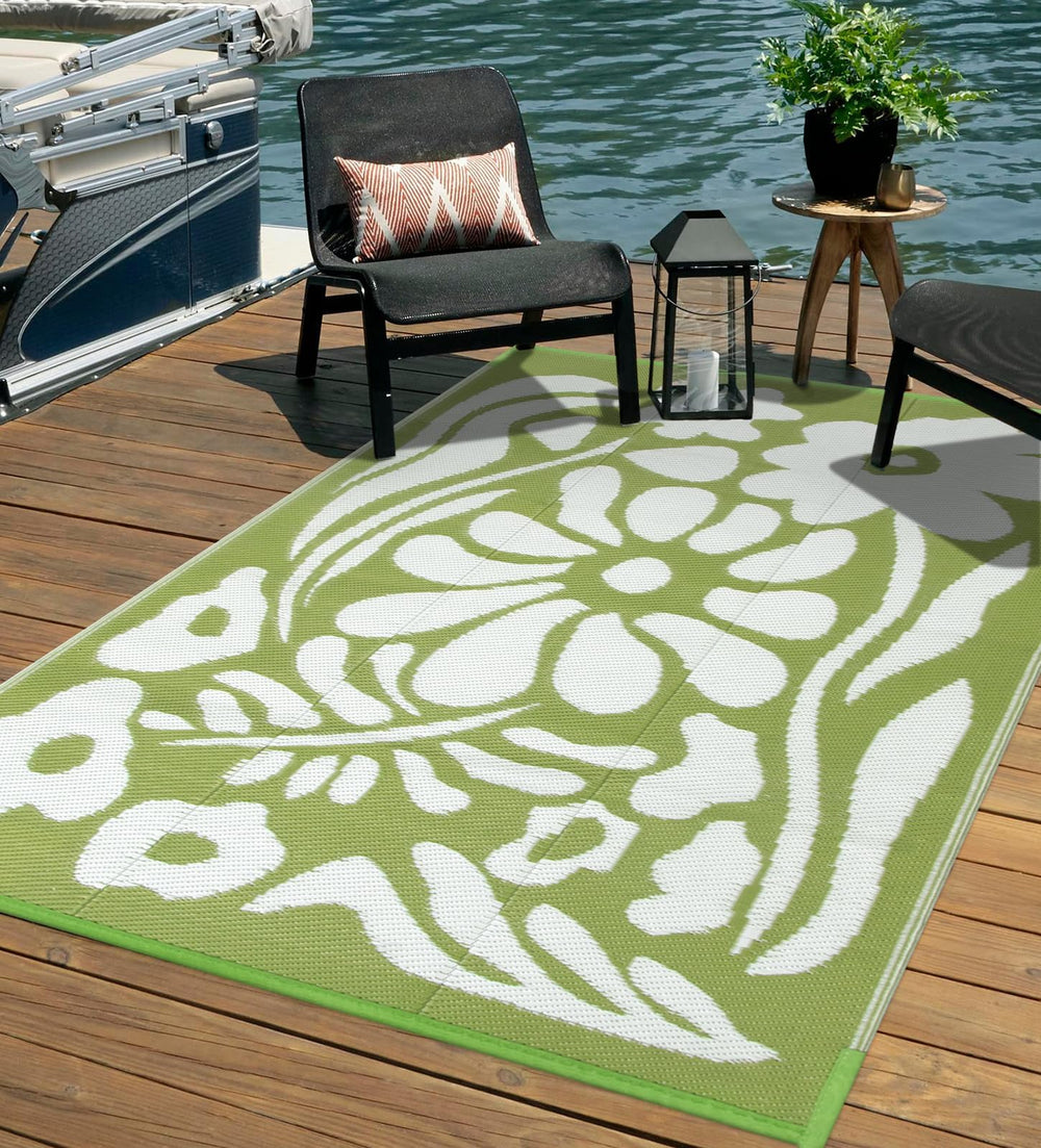 Uphome outdoor rug laid out in a camping setup