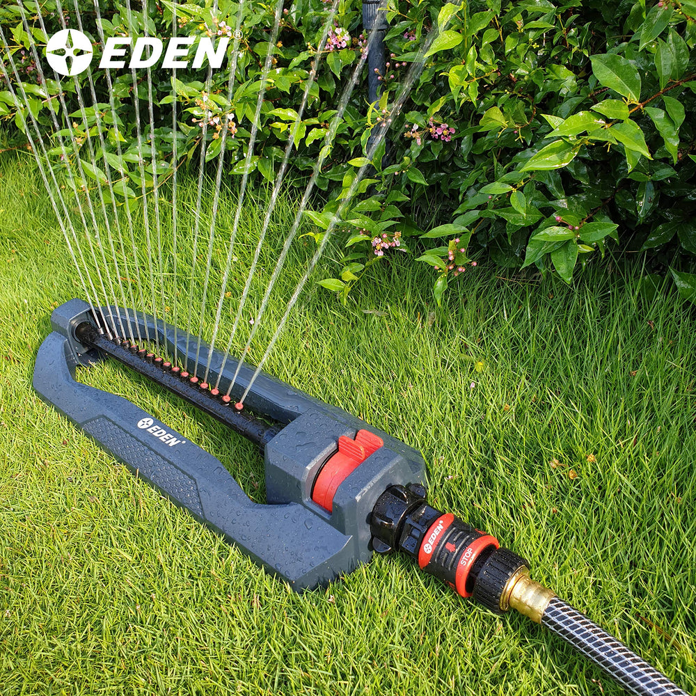 User attaching Eden connector to garden hose