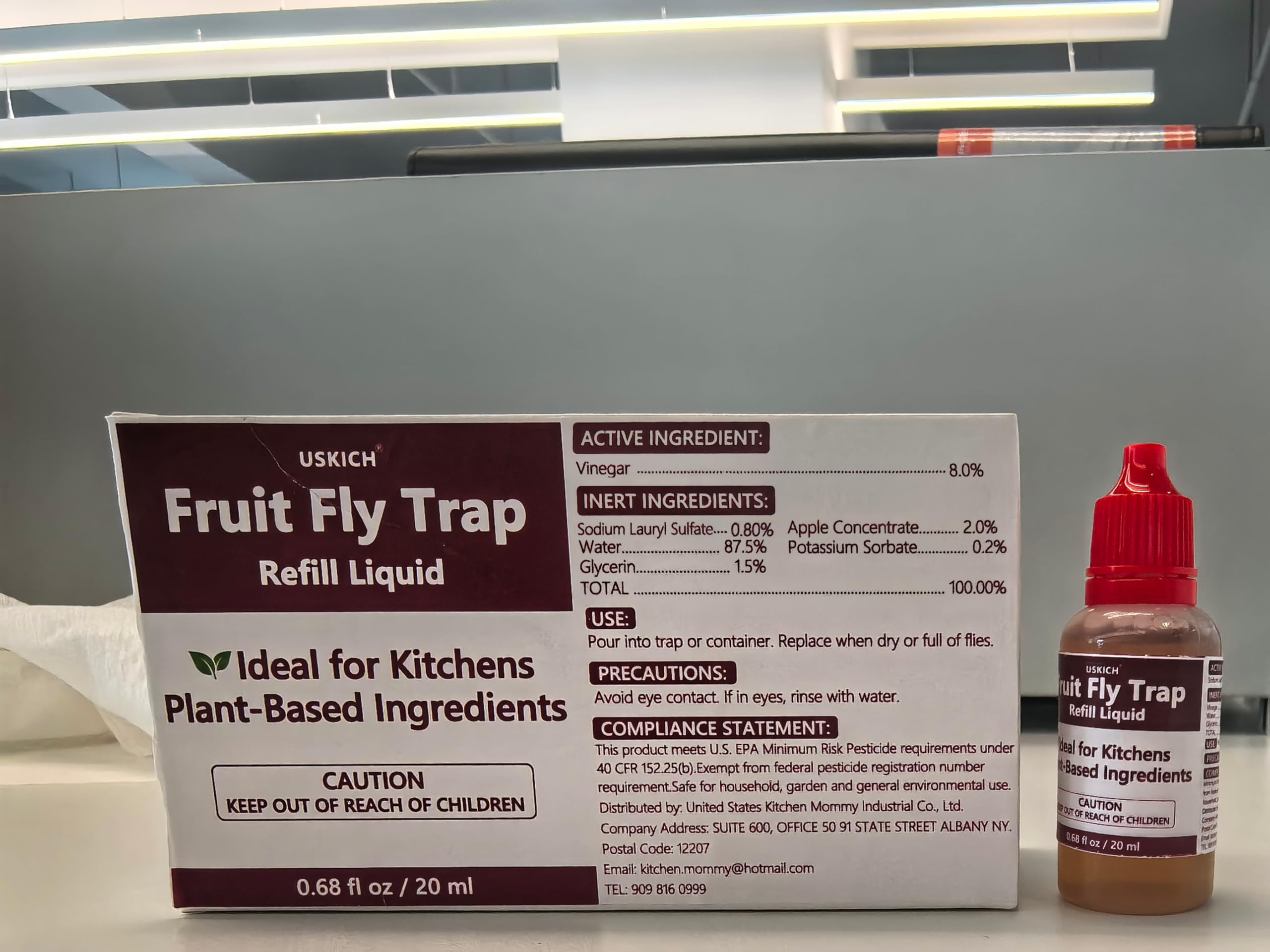 USKICH Fruit Fly Trap Refill Liquid in kitchen setting