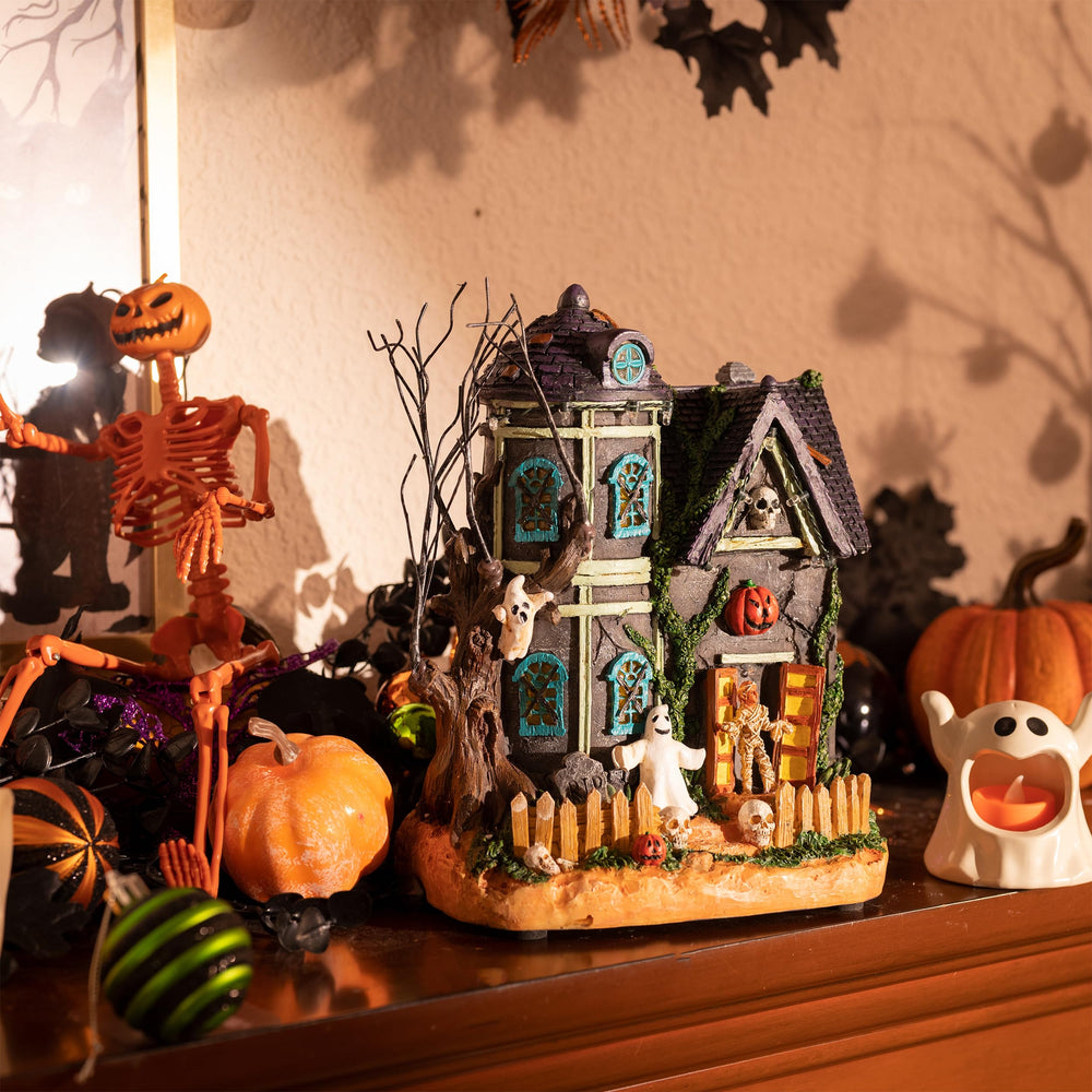 Valery Madelyn Halloween Village on a dining table
