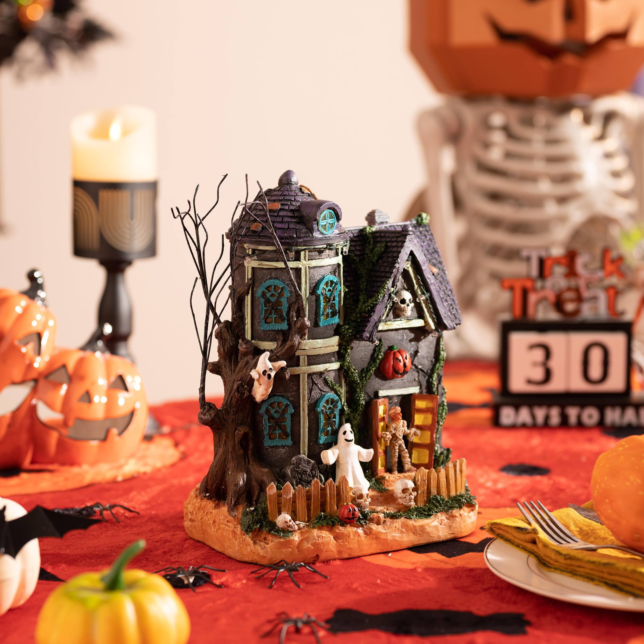 Valery Madelyn Halloween Village with eerie ghost decorations