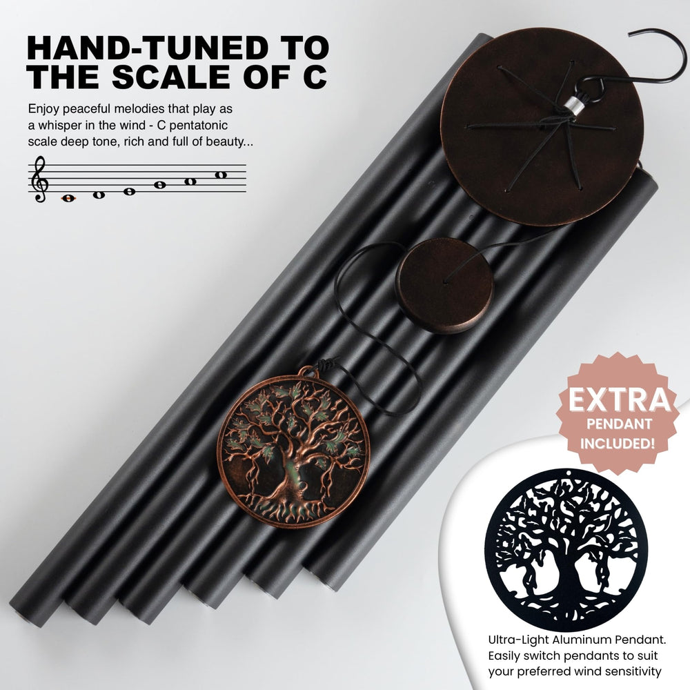 Vanquer Wind Chimes in a garden setting with greenery