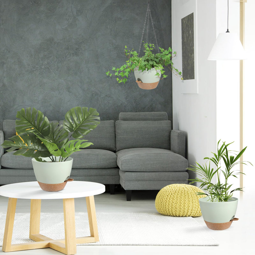 Vanslogreen 12 Inch hanging planter displayed with herbs