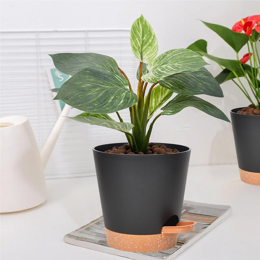 Vanslogreen plastic planters showcasing drainage system