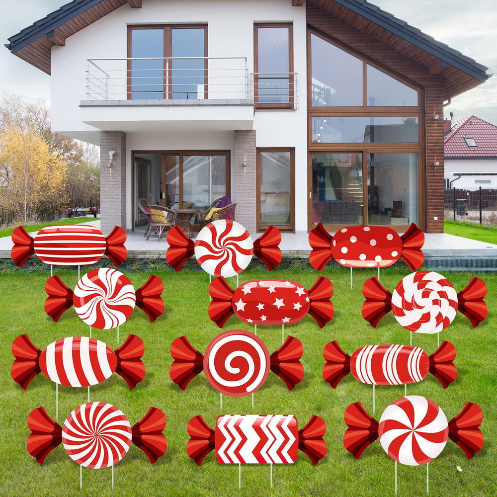 Various BBTO candy cane yard signs in festive colours