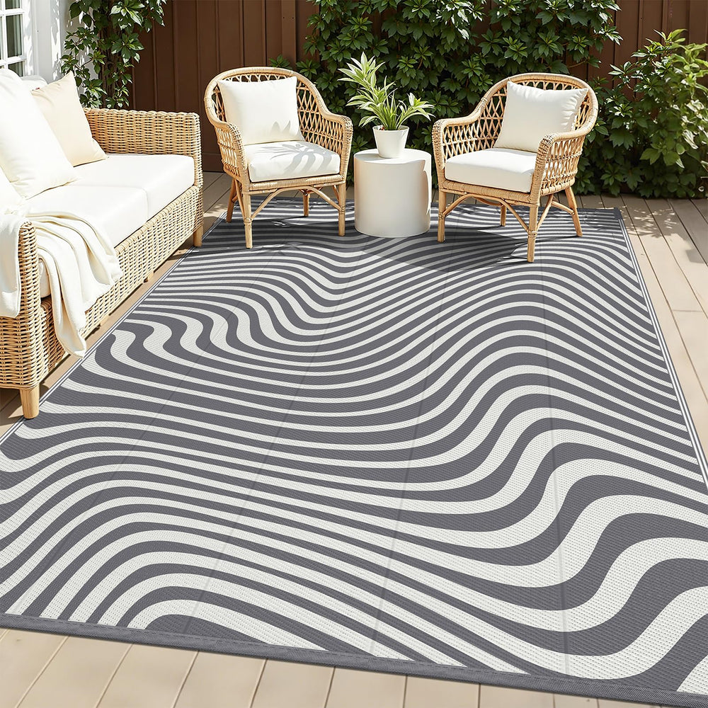 Vaukki 5x8 waterproof outdoor rug in grey striped design front view