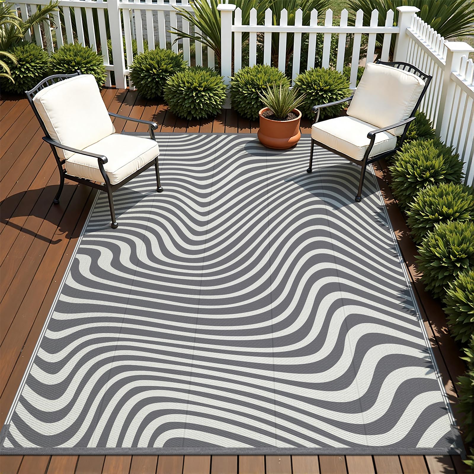 Vaukki outdoor rug laid out by poolside