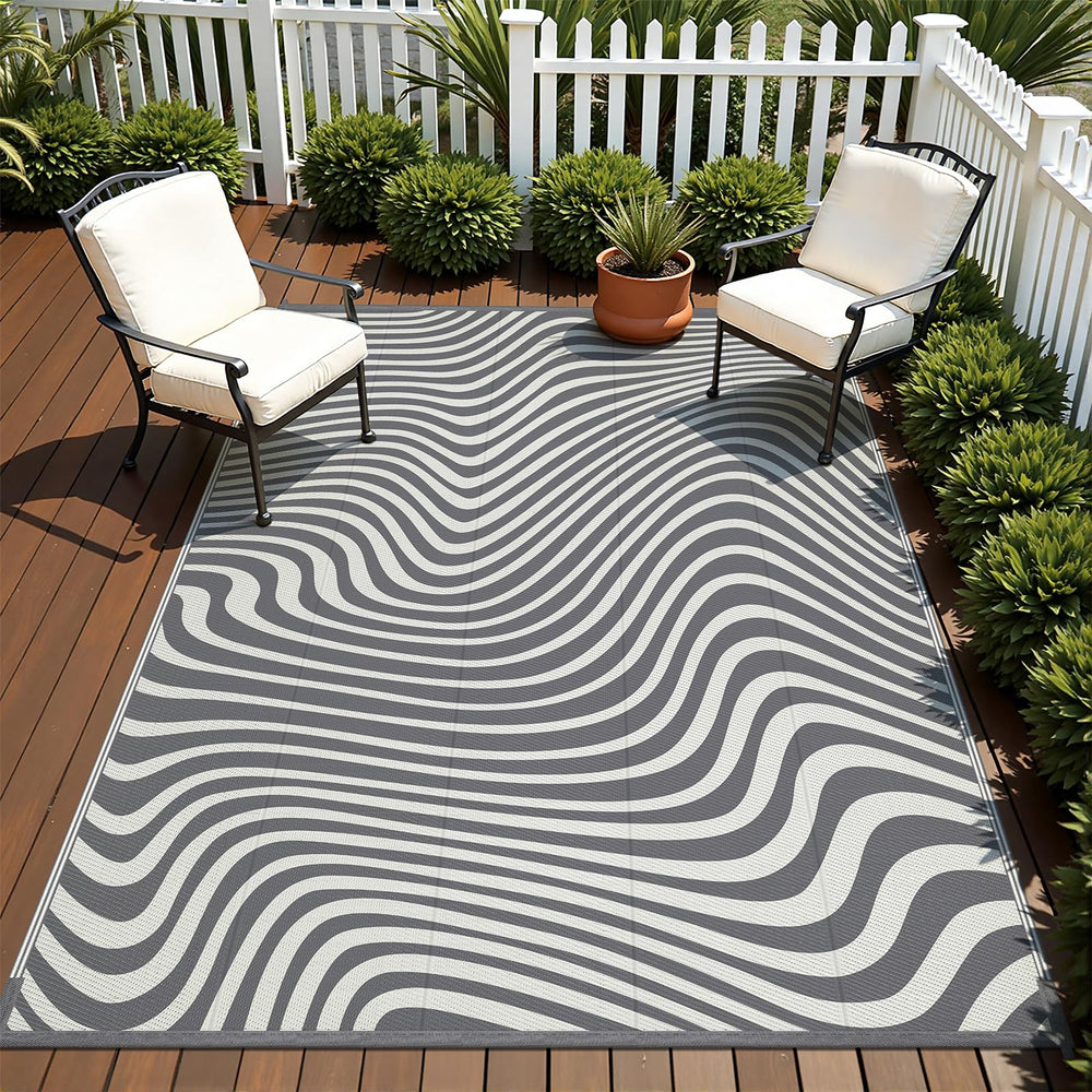 Vaukki outdoor rug laid out by poolside