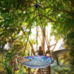 VCUTEKA Hanging Birdbath filled with water in a garden setting