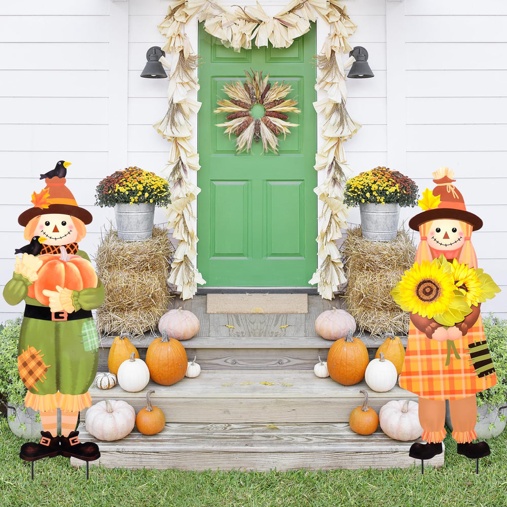 VCUTEKA scarecrow yard stakes in a garden setting
