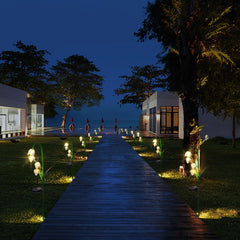 VCUTEKA solar garden light glowing at night