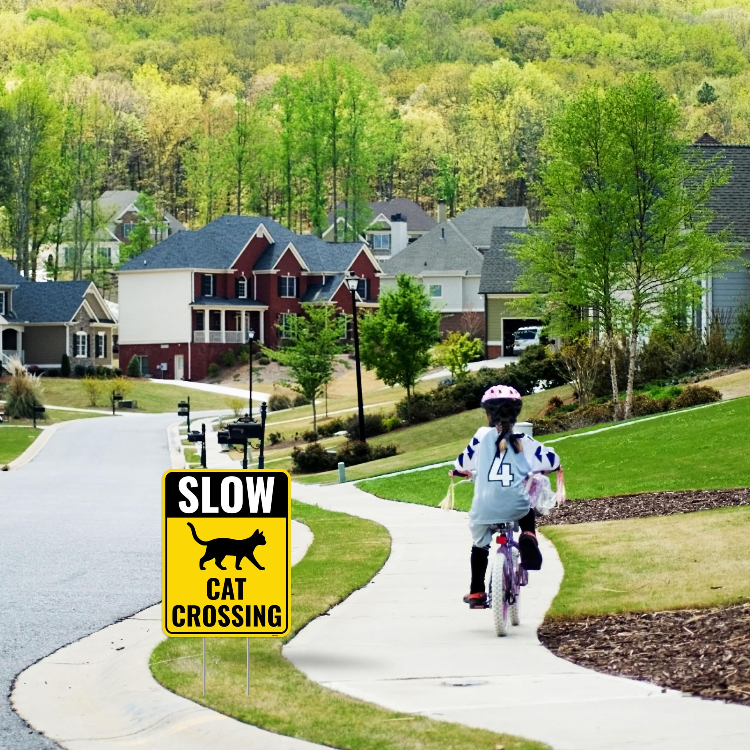 Venicor Cat Crossing Sign in a yard setting with grass