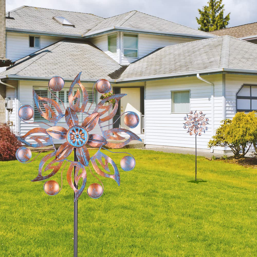 VEWOGARDEN Metal Wind Spinners installed in a garden setting