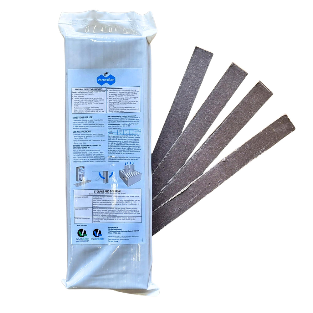 VITA BEEHEALTH Varroxsan Oxalic Acid Strips displayed on a wooden hive frame