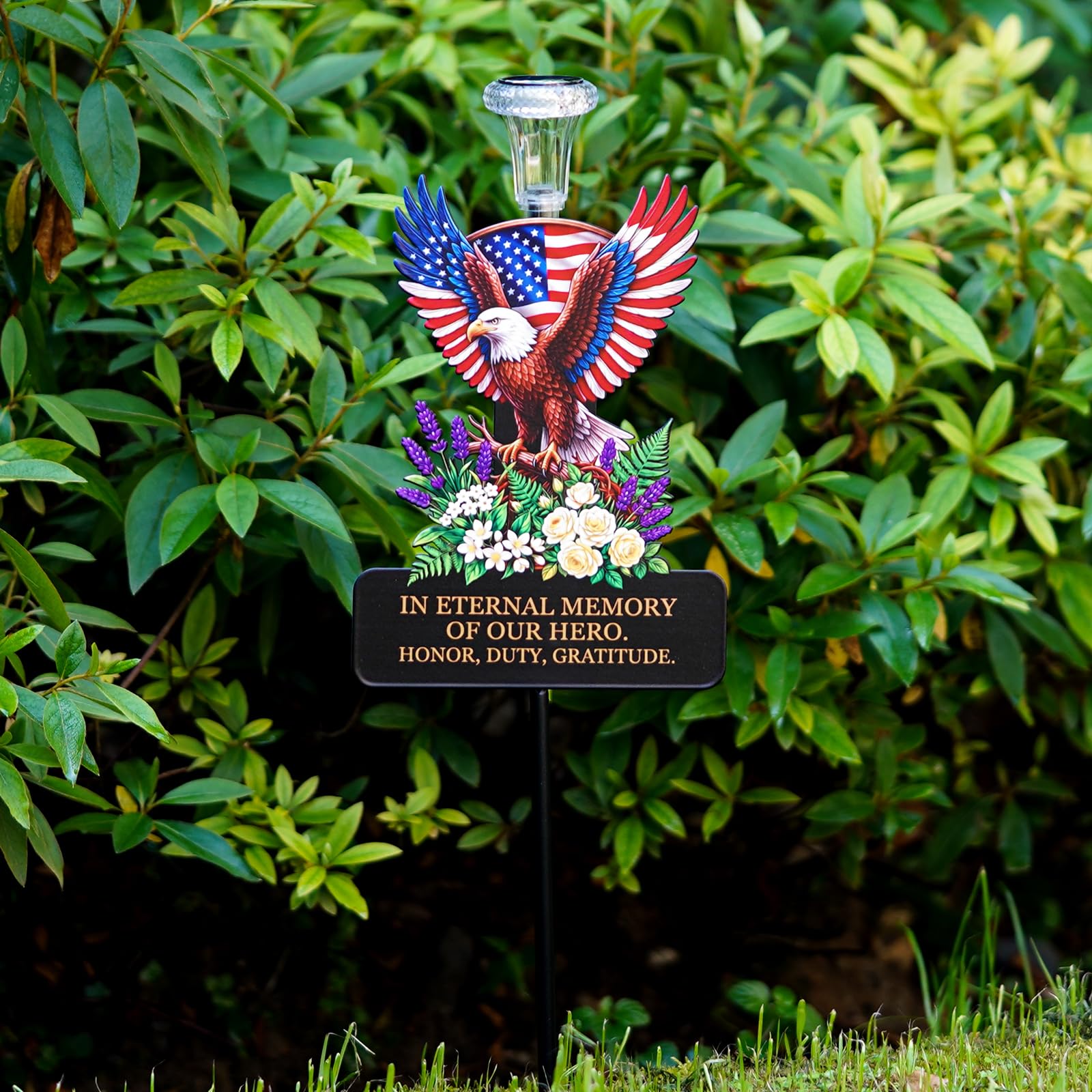 VKEVOC Solar Eagle Memorial Stake beside a headstone